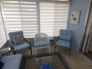 Move in ready! Complete with high end furnishings! Zebra blinds on Grasslands Golf and Country Club in Florida - for sale on GolfHomes.com, golf home, golf lot