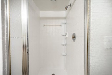 Step into this spacious and beautifully maintained 2-br, 2-ba on Palm-Aire Country Club and Resort - Palms in Florida - for sale on GolfHomes.com, golf home, golf lot