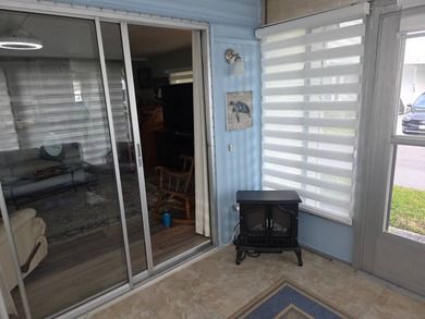 Move in ready! Complete with high end furnishings! Zebra blinds on Grasslands Golf and Country Club in Florida - for sale on GolfHomes.com, golf home, golf lot