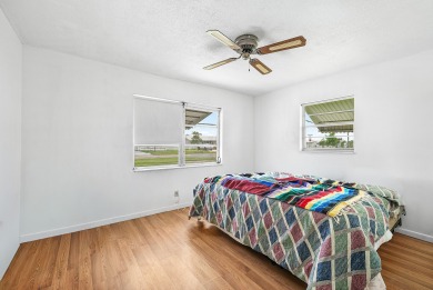 Welcome to this charming 2-bed, 2-bath single-family home on a on Leisureville Community Golf Course in Florida - for sale on GolfHomes.com, golf home, golf lot