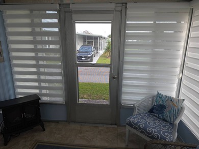 Move in ready! Complete with high end furnishings! Zebra blinds on Grasslands Golf and Country Club in Florida - for sale on GolfHomes.com, golf home, golf lot