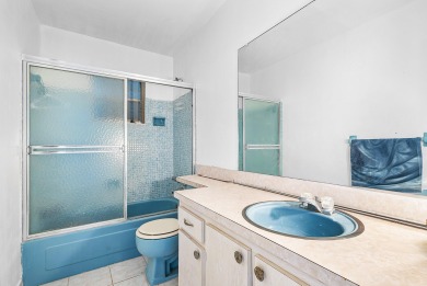Welcome to this charming 2-bed, 2-bath single-family home on a on Leisureville Community Golf Course in Florida - for sale on GolfHomes.com, golf home, golf lot