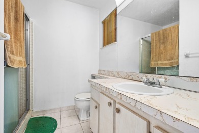Welcome to this charming 2-bed, 2-bath single-family home on a on Leisureville Community Golf Course in Florida - for sale on GolfHomes.com, golf home, golf lot