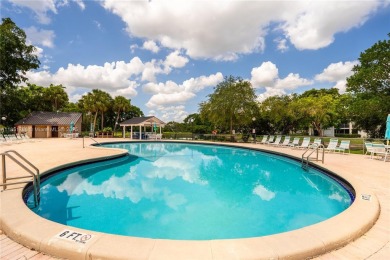 Step into this spacious and beautifully maintained 2-br, 2-ba on Palm-Aire Country Club and Resort - Palms in Florida - for sale on GolfHomes.com, golf home, golf lot