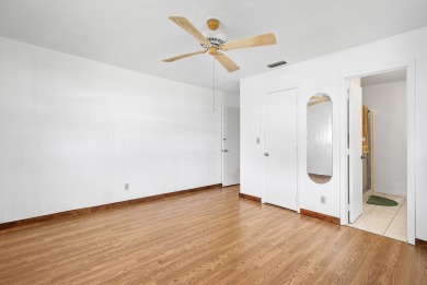 Welcome to this charming 2-bed, 2-bath single-family home on a on Leisureville Community Golf Course in Florida - for sale on GolfHomes.com, golf home, golf lot