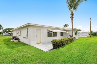 Welcome to this charming 2-bed, 2-bath single-family home on a on Leisureville Community Golf Course in Florida - for sale on GolfHomes.com, golf home, golf lot