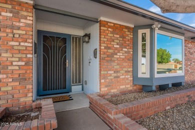 This charming Dobson Ranch home is freshly painted throughout on Dobson Ranch Municipal Golf Course in Arizona - for sale on GolfHomes.com, golf home, golf lot