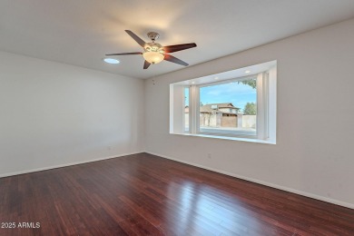 This charming Dobson Ranch home is freshly painted throughout on Dobson Ranch Municipal Golf Course in Arizona - for sale on GolfHomes.com, golf home, golf lot