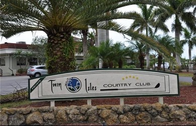 Envision your custom-built dream home perfectly positioned for on Twin Isles Country Club in Florida - for sale on GolfHomes.com, golf home, golf lot