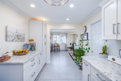 Welcome To This Beautifully Updated 3-Bedroom, 2-Bathroom Ranch on Middle Bay Country Club in New York - for sale on GolfHomes.com, golf home, golf lot