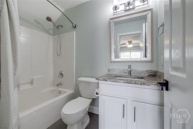 Enjoy resort-style living in this beautifully updated 4-bedroom on Lost Plantation Golf Club in Georgia - for sale on GolfHomes.com, golf home, golf lot