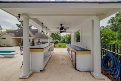 Enjoy resort-style living in this beautifully updated 4-bedroom on Lost Plantation Golf Club in Georgia - for sale on GolfHomes.com, golf home, golf lot