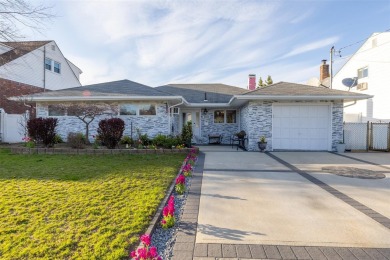 Welcome To This Beautifully Updated 3-Bedroom, 2-Bathroom Ranch on Middle Bay Country Club in New York - for sale on GolfHomes.com, golf home, golf lot