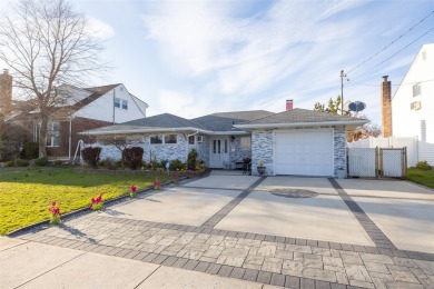 Welcome To This Beautifully Updated 3-Bedroom, 2-Bathroom Ranch on Middle Bay Country Club in New York - for sale on GolfHomes.com, golf home, golf lot