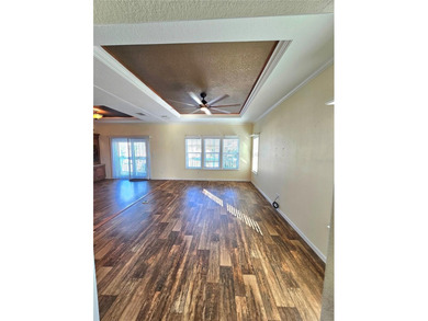 Welcome to a cheerful and inviting home tucked within the on Saint Andrews South Golf Club in Florida - for sale on GolfHomes.com, golf home, golf lot