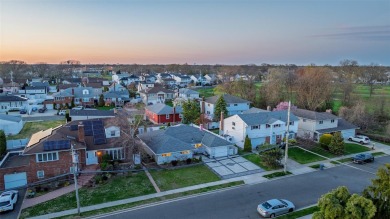 Welcome To This Beautifully Updated 3-Bedroom, 2-Bathroom Ranch on Middle Bay Country Club in New York - for sale on GolfHomes.com, golf home, golf lot