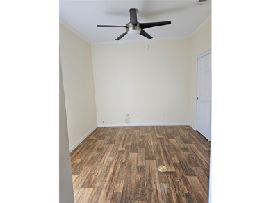 Welcome to a cheerful and inviting home tucked within the on Saint Andrews South Golf Club in Florida - for sale on GolfHomes.com, golf home, golf lot