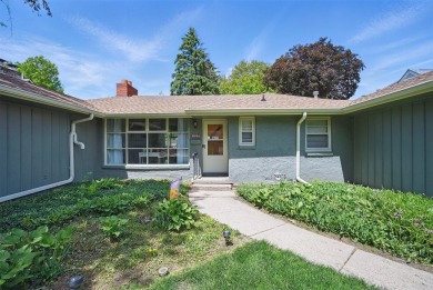 Welcome to this beautifully updated mid-century modern ranch in on Wakonda Club in Iowa - for sale on GolfHomes.com, golf home, golf lot