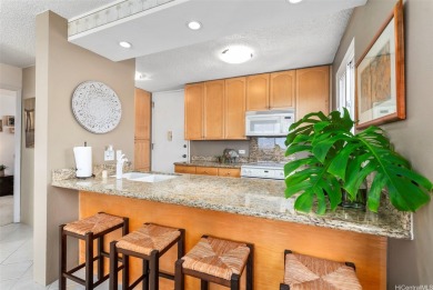 Located across from Pearlridge Center, this modern, renovated 2 on Pearl Country Club in Hawaii - for sale on GolfHomes.com, golf home, golf lot