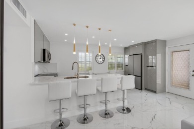 Prepare to be impressed--this 1st-floor 2 bed, 2 bath Kings on Kings Point Golf -Flanders Way in Florida - for sale on GolfHomes.com, golf home, golf lot