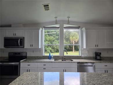Zellwood Station Very well maintained 3-Bedroom 2 bath Palm on Zellwood Station Country Club in Florida - for sale on GolfHomes.com, golf home, golf lot