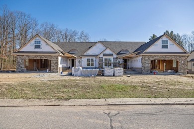 Spacious open, airy floor plan, gourmet kitchen, Gorgeous wooded on Tullymore Golf Club in Michigan - for sale on GolfHomes.com, golf home, golf lot