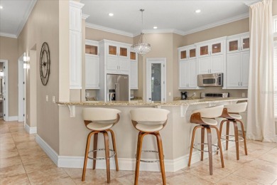 Welcome to 360 Muirfield Loop, an immaculate home that offers on ChampionsGate Golf Resort in Florida - for sale on GolfHomes.com, golf home, golf lot