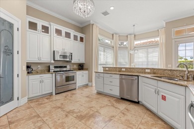 Welcome to 360 Muirfield Loop, an immaculate home that offers on ChampionsGate Golf Resort in Florida - for sale on GolfHomes.com, golf home, golf lot