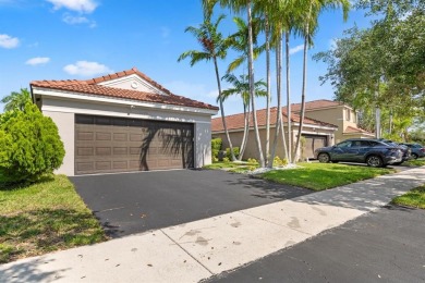 Welcome to this beautifully updated 3BR/2BA one-story home in on Weston Hills Country Club in Florida - for sale on GolfHomes.com, golf home, golf lot