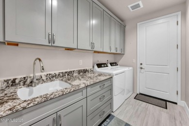 Welcome to Carriage House - Where Modern Living Meets Timeless on LakeRidge Golf Course in Nevada - for sale on GolfHomes.com, golf home, golf lot