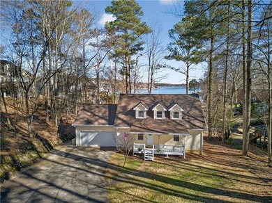 Lakefront Luxury Living with Stunning Views! This beautifully on Fairfield Plantation Golf and Country Club in Georgia - for sale on GolfHomes.com, golf home, golf lot