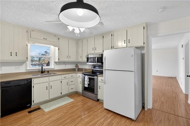 Lakefront Luxury Living with Stunning Views! This beautifully on Fairfield Plantation Golf and Country Club in Georgia - for sale on GolfHomes.com, golf home, golf lot