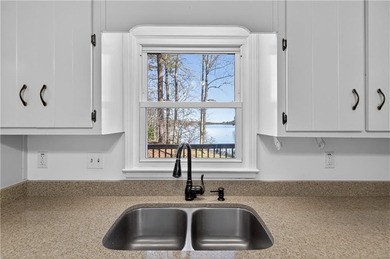 Lakefront Luxury Living with Stunning Views! This beautifully on Fairfield Plantation Golf and Country Club in Georgia - for sale on GolfHomes.com, golf home, golf lot