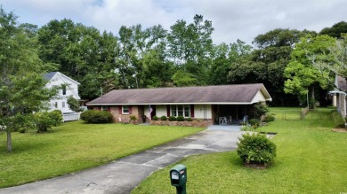 Step back in time with this lovingly maintained single-family on Pine Lakes Country Club in South Carolina - for sale on GolfHomes.com, golf home, golf lot