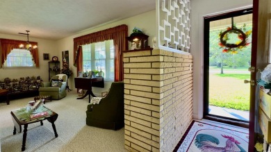 Step back in time with this lovingly maintained single-family on Pine Lakes Country Club in South Carolina - for sale on GolfHomes.com, golf home, golf lot