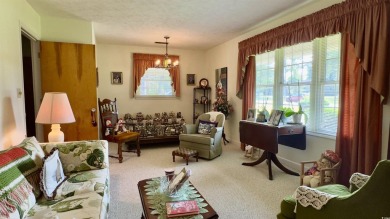 Step back in time with this lovingly maintained single-family on Pine Lakes Country Club in South Carolina - for sale on GolfHomes.com, golf home, golf lot