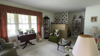 Step back in time with this lovingly maintained single-family on Pine Lakes Country Club in South Carolina - for sale on GolfHomes.com, golf home, golf lot