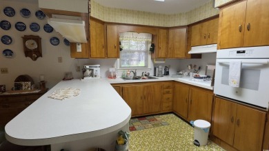 Step back in time with this lovingly maintained single-family on Pine Lakes Country Club in South Carolina - for sale on GolfHomes.com, golf home, golf lot