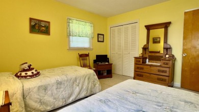 Step back in time with this lovingly maintained single-family on Pine Lakes Country Club in South Carolina - for sale on GolfHomes.com, golf home, golf lot