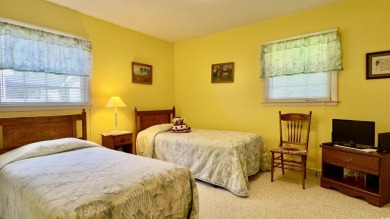 Step back in time with this lovingly maintained single-family on Pine Lakes Country Club in South Carolina - for sale on GolfHomes.com, golf home, golf lot