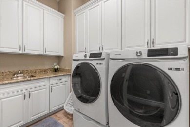 Welcome to 360 Muirfield Loop, an immaculate home that offers on ChampionsGate Golf Resort in Florida - for sale on GolfHomes.com, golf home, golf lot