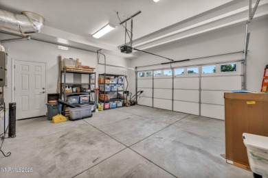 Welcome to Carriage House - Where Modern Living Meets Timeless on LakeRidge Golf Course in Nevada - for sale on GolfHomes.com, golf home, golf lot