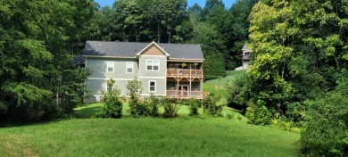 Welcome to this charming one-level home, perfectly situated to on Mountain Harbour Golf Club in North Carolina - for sale on GolfHomes.com, golf home, golf lot