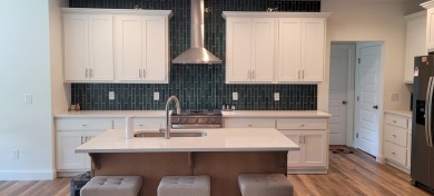 Welcome to this charming one-level home, perfectly situated to on Mountain Harbour Golf Club in North Carolina - for sale on GolfHomes.com, golf home, golf lot