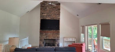 Welcome to this charming one-level home, perfectly situated to on Mountain Harbour Golf Club in North Carolina - for sale on GolfHomes.com, golf home, golf lot