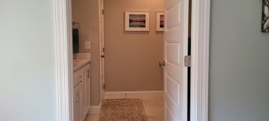 Welcome to this charming one-level home, perfectly situated to on Mountain Harbour Golf Club in North Carolina - for sale on GolfHomes.com, golf home, golf lot