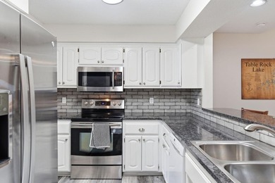 Welcome to this beautifully furnished, low-maintenance 3-bedroom on Ledgestone Country Club and Golf Course in Missouri - for sale on GolfHomes.com, golf home, golf lot