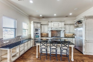 Set on a premier golf course lot with breathtaking sunset views on The Trails of Frisco Golf Club in Texas - for sale on GolfHomes.com, golf home, golf lot