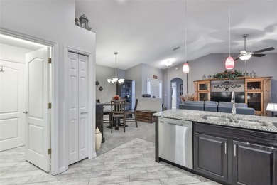 Wake up every day feeling like you're on vacation in this on Tampa Bay Golf and Country Club in Florida - for sale on GolfHomes.com, golf home, golf lot