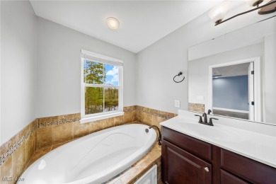 Welcome to this beautifully maintained 4-bedroom home with a on Shale Creek Golf Club in Ohio - for sale on GolfHomes.com, golf home, golf lot